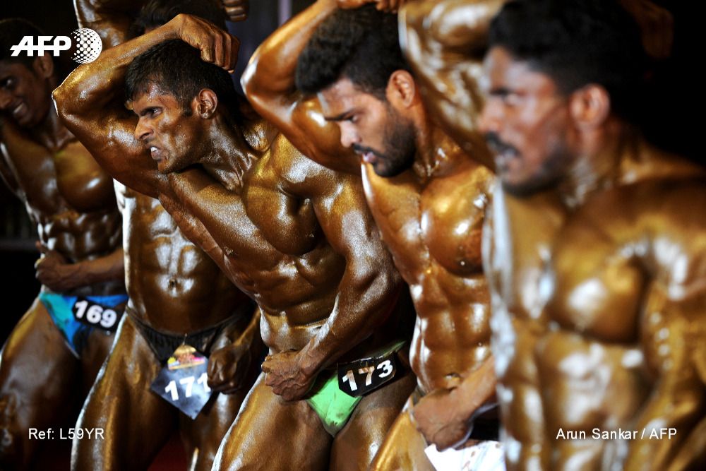 Indian body builders display their muscles during the &#39;Mr Steelman&#39; body building championship in Chennai … | Body building women, Body builder, Bodybuilding videos